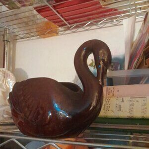 Brown glass swan